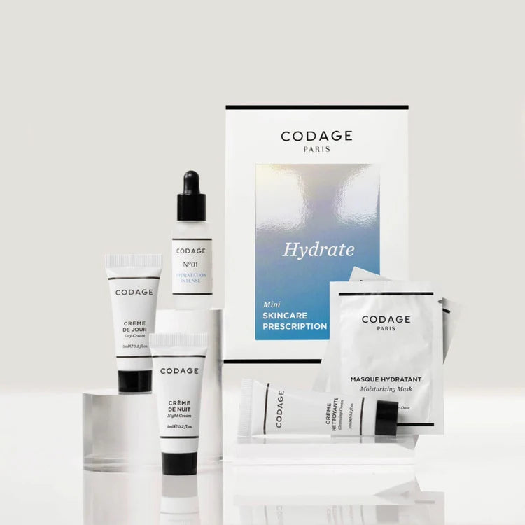 Codage Paris skincare products including bottles, a dropper, and packets on a white background